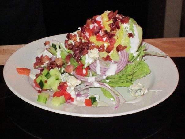 Iceberg Wedge with Warm Bacon and Blue Cheese Dressing