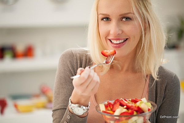 Woman Eating a Fruit Saladnutritional diet