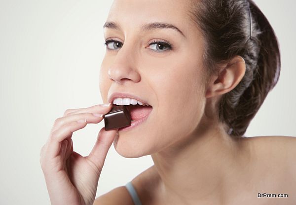 Woman eating chocolate