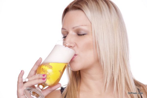 Blonde drinking beer
