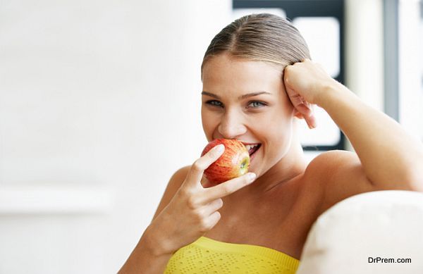 lady eating apple to boost sex drive