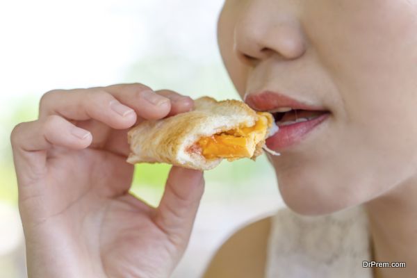 women eating sandwich