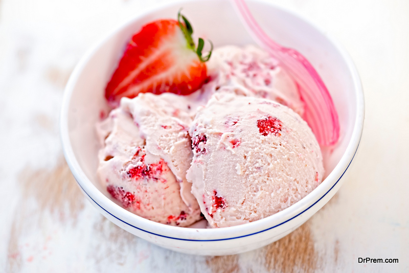 Strawberry cream ice cream in white bowl